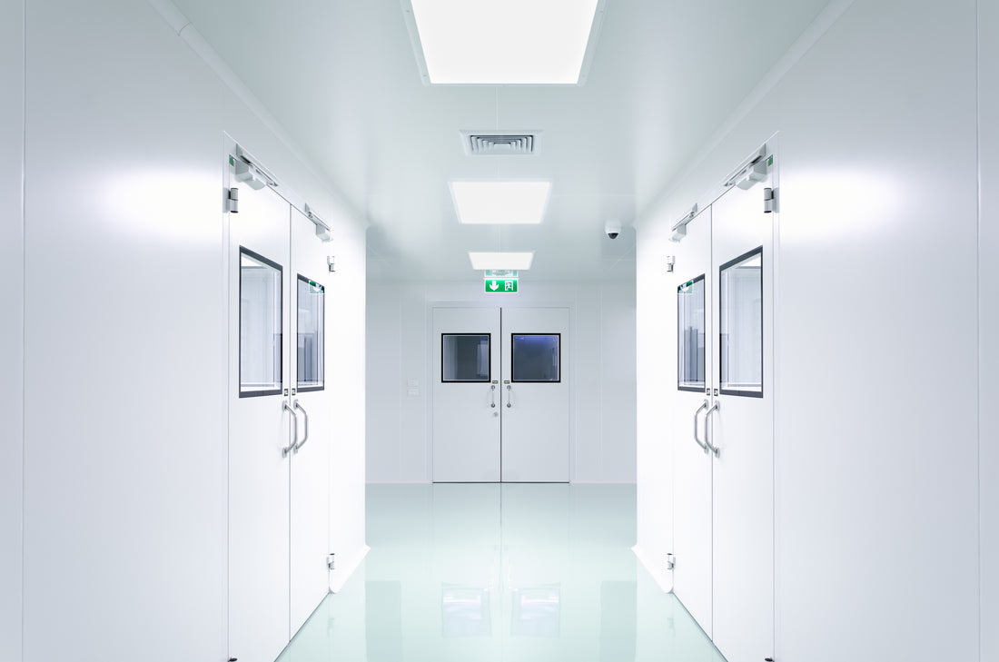 Substantial and persistent reduction of bioburden in a pharmaceutical facility